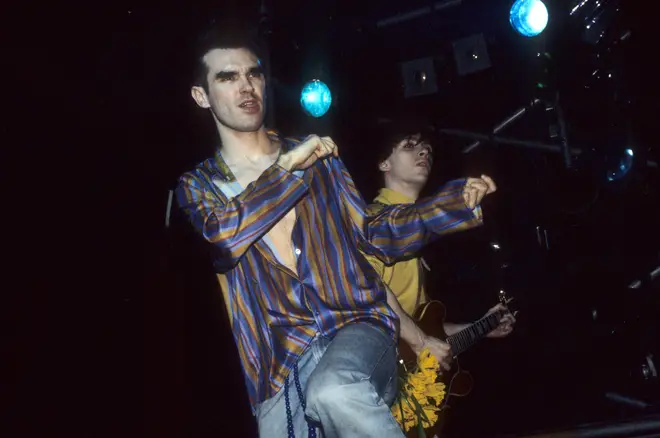 Morrissey and Johnny Marr performing with The Smiths in 1984