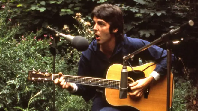 Paul McCartney in the back garden of Abbey Road studios, as seen in the One Hand Clapping film