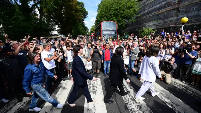 Beatles fans flock to Abbey Road to celebrate 50 years of their iconic photo