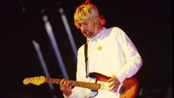 Kurt Cobain playing with Nirvana at Reading Festival in 1992