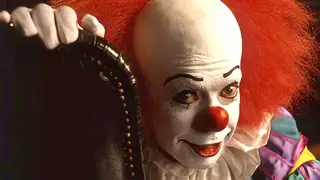 Tim Curry as Pennywise in the original TV movie of "IT"