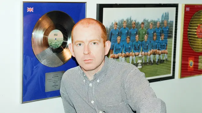 Alan McGee in his Creation Records office, 1996