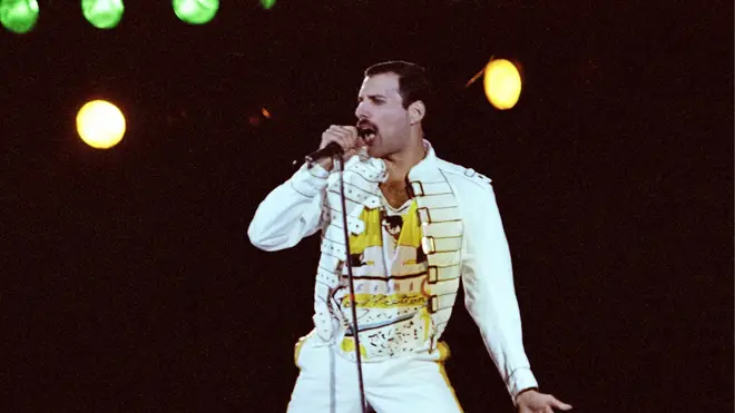 Freddie Mercury performing live on stage at Knebworth, 9 August 1986
