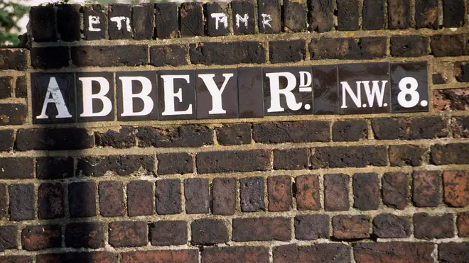 One of the few remaining original "Abbey Road" signs pictured 1998