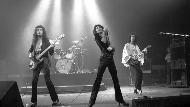 Queen performing live in 1974: John Deacon, Roger Taylor, Freddie Mercury and Brian May