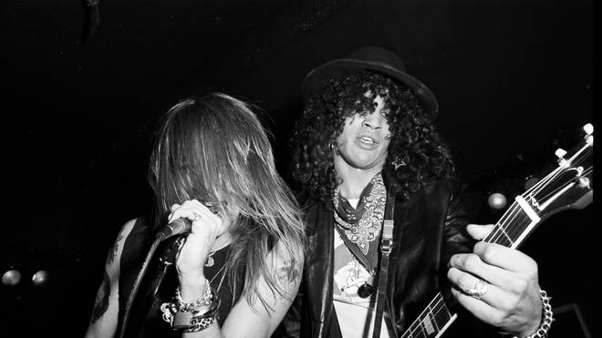 Axl Rose and Slash of the rock band Guns n' Roses performst at Radio City on October 31, 1985