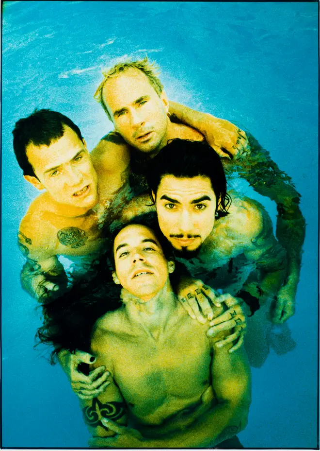 Red Hot Chili Peppers, posed in a swimming pool, Sunset Marquee, Los Angeles, CA, 18th August 1995.