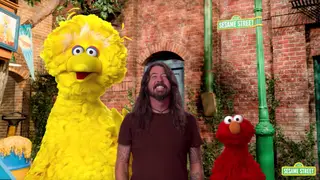 Dave Grohl sings the Here We Go song on Sesame Street with Big Bird and Elmo