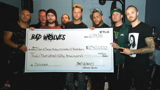 Bad Wolves present The Cranberries singer Dolores O'Riordan's family with a cheque for £250,000