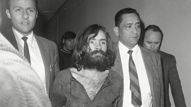 Charles Manson, pictured en route to court in Independence, Calif., for a preliminary hearing on charges of possessing stolen property, December 1969