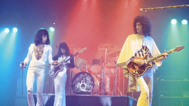 Freddie Mercury, John Deacon and Brian May performing live on stage, 29 November 1975