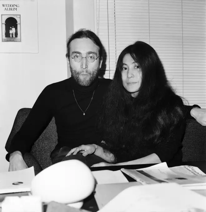Beatles singer John Lennon with wife Yoko Ono at Apple headquarters as he sends his MBE back to The Queen.