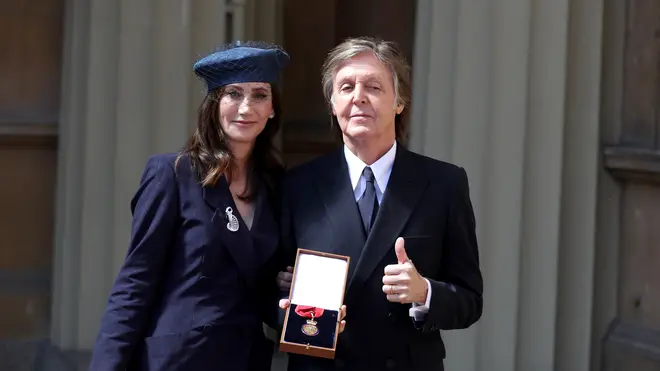 Sir Paul McCartney and his wife Nancy Shevell following an Investiture ceremony, where he was made a Companion of Honour at Buckingham Palace on May 4, 2018
